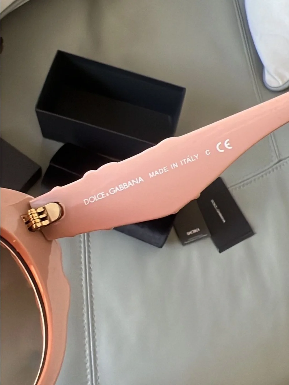 Dolce & Gabbana Pink Floral Round Sunglasses with Dark Lenses